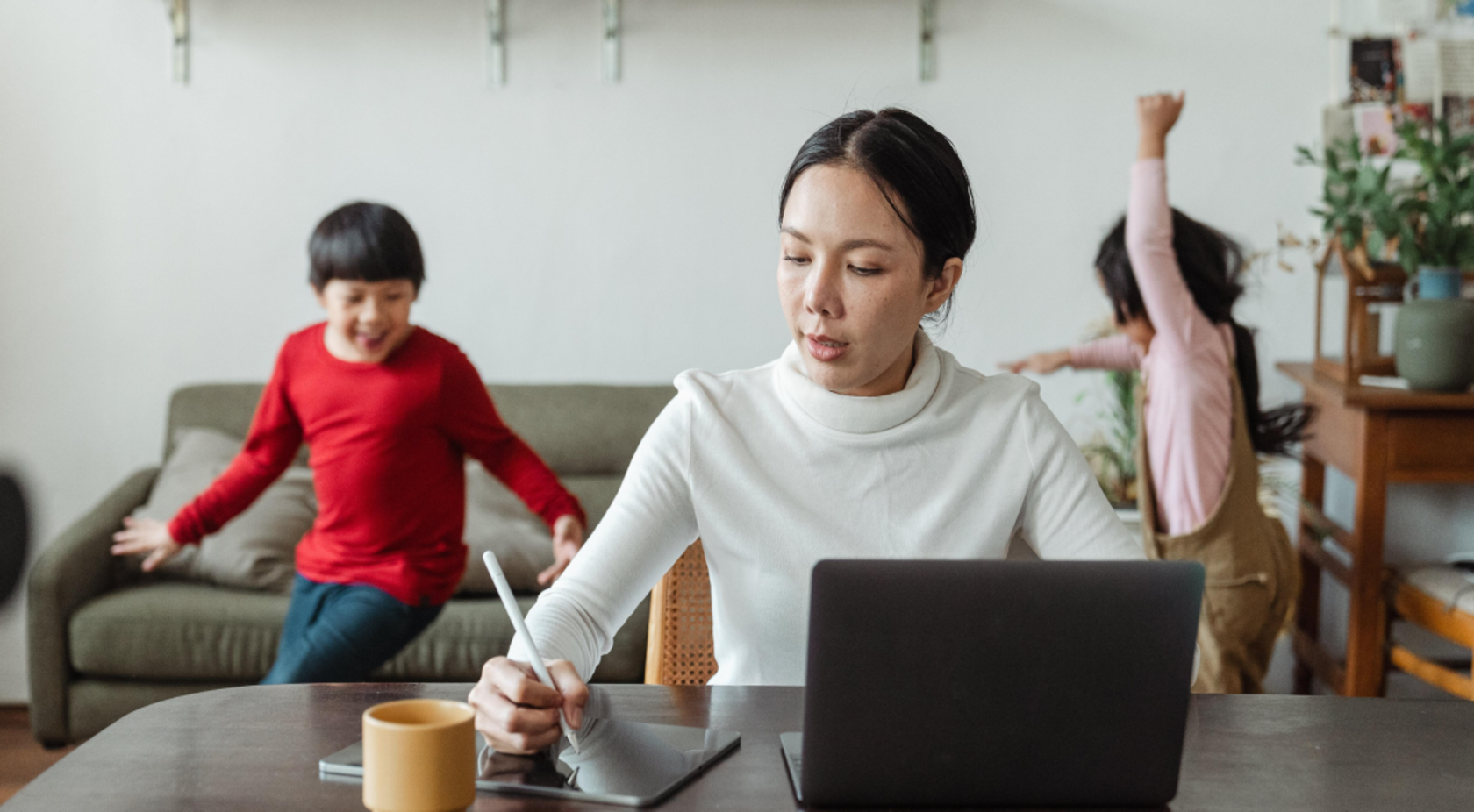 parent with children working from home